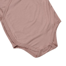 Load image into Gallery viewer, snap button detail on the bottom of a pink onesie for babies
